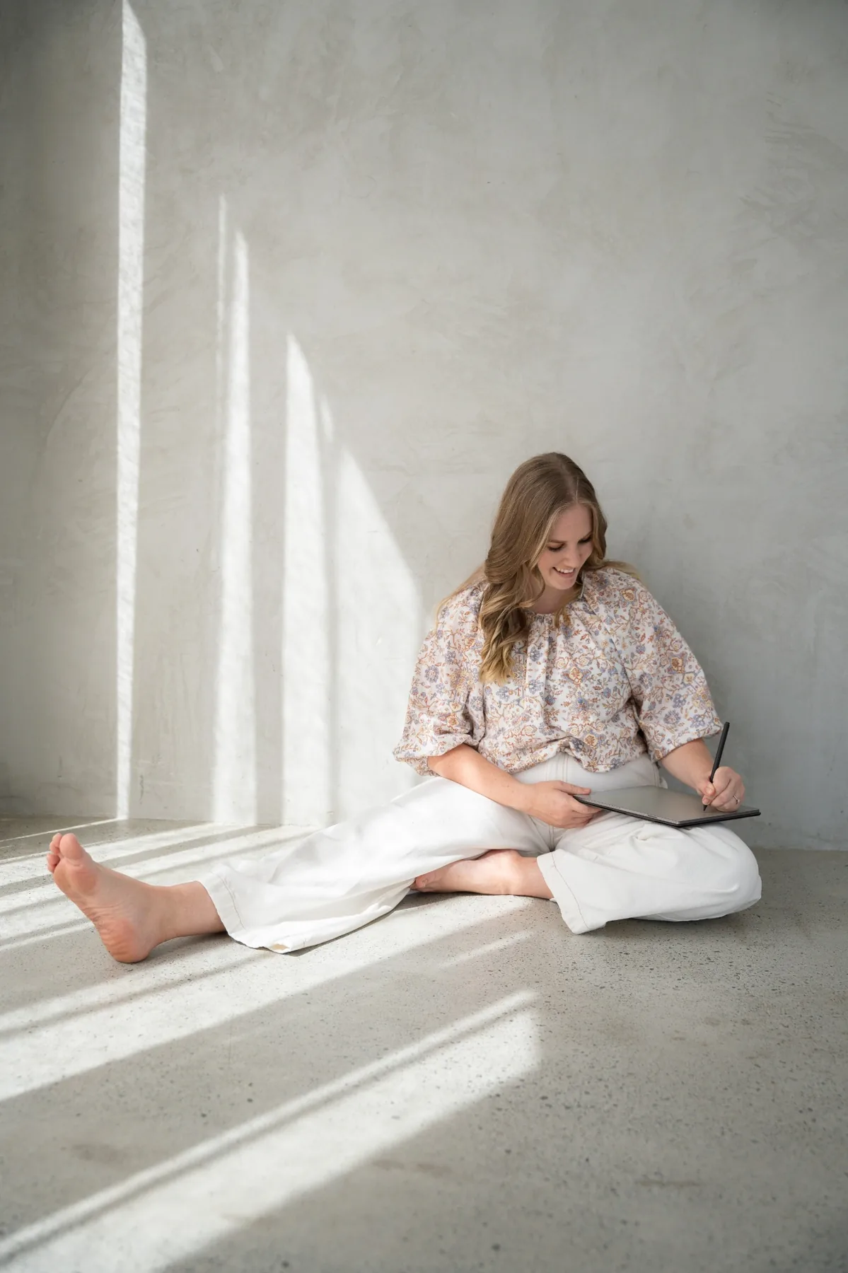 Dayle sitting in a bright, calm space